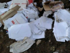 В Новороссийске в спасающий от наводнений овраг выбросили личные документы горожан
