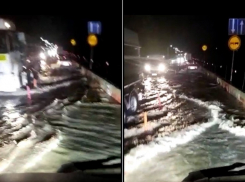 Сплошные волны: затопленную трассу в Северском районе сняли на видео