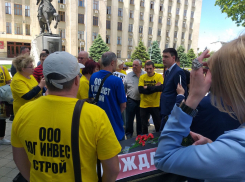Мэрия Краснодара погрозила судом после акции с гробом обманутых дольщиков