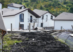 Компенсация из-за оползня: собственники элитного жилья получат до ста тысяч рублей