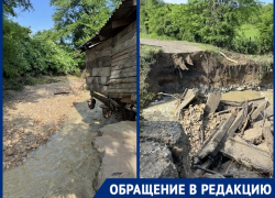 Снесло мост, под домом – вода: стихия «ударила» по станице на Кубани 