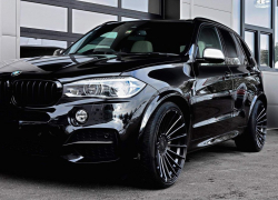 На Кубани пристав нашел автомобиль BMW X5 в кустах
