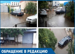  После ремонта дороги стало затапливать двор и тротуар в Краснодаре 